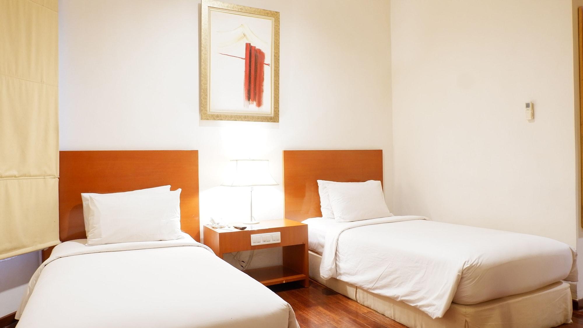 Hotel Santika Понтианак Экстерьер фото